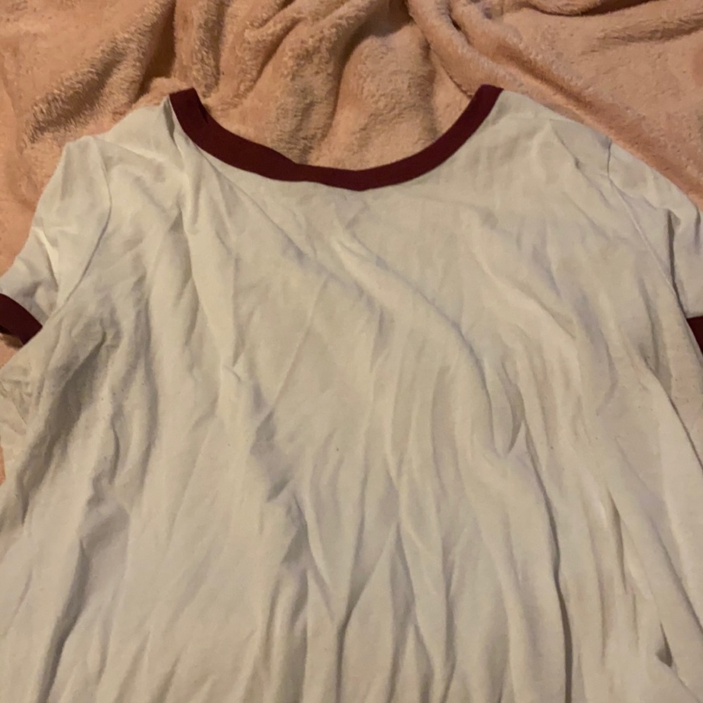 White with red collar shirt